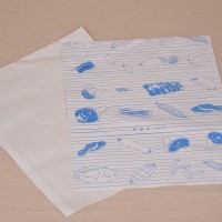 Halványszürke fóliázott húscsomagoló papír kék színű hús mintával - 40x30 cm / 10 kg